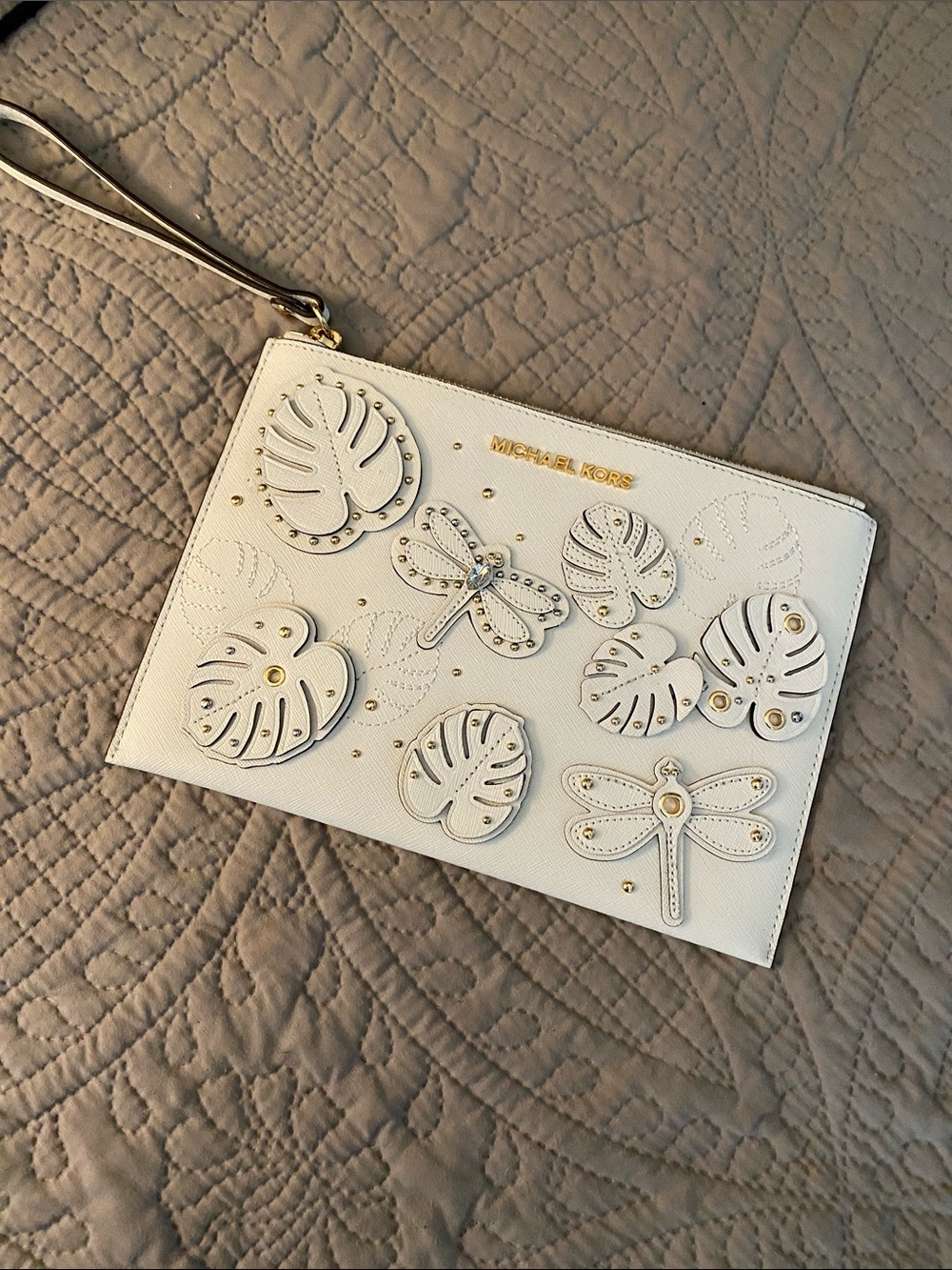 Michael Kors White Floral & Dragonfly Wristlet with Gold Hardware